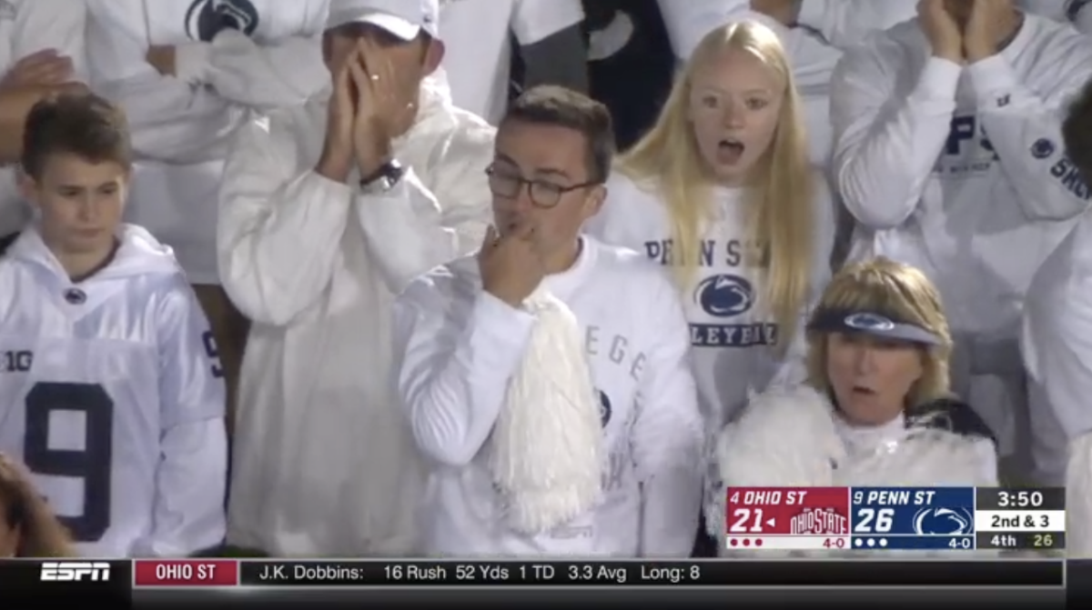 A Penn State fan looking upset.