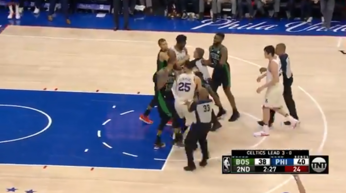 Terry Rozier and Joel Embiid scuffle during Game 4.