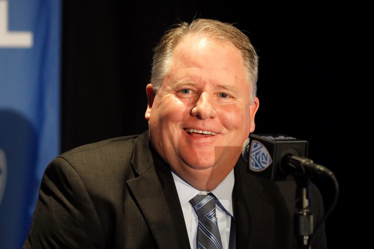 Chip Kelly speaking to the media during a press conference.