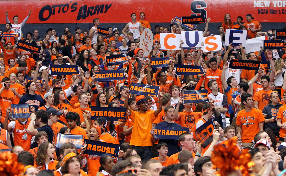 Syracuse fans cheer on their team.