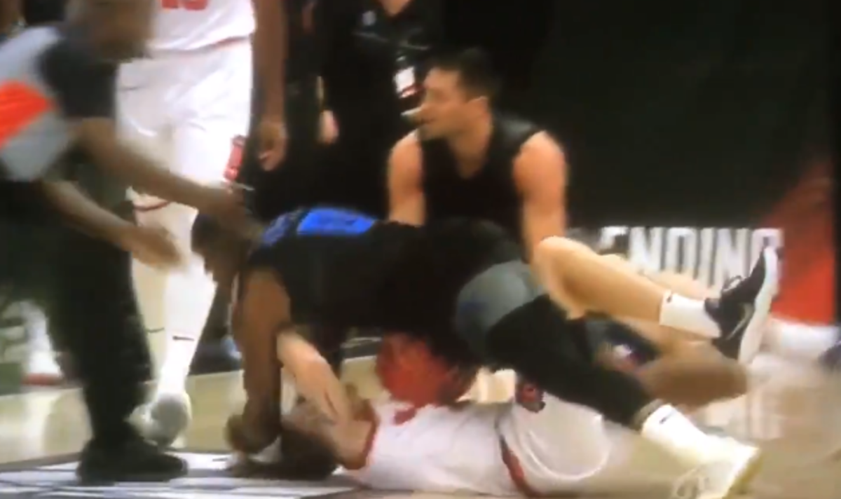 Eric Devendorf elbowed by Dominique Sutton during a TBT game.