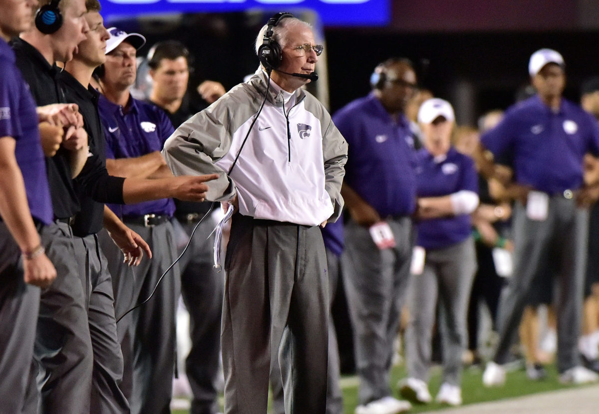 Bill Snyder watches on from the sidelines.