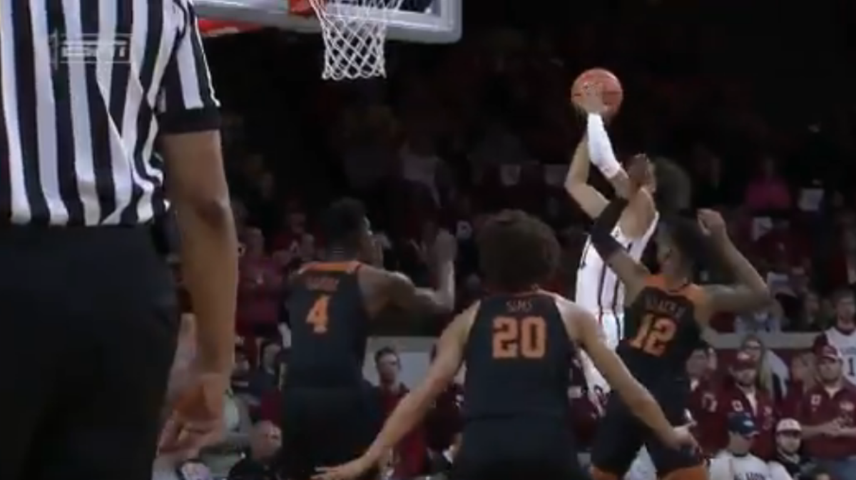 Trae Young takes a shot against Texas.
