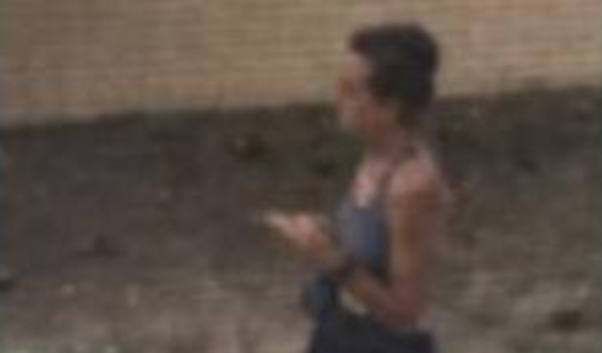 Female runner who allegedly poops in yards.