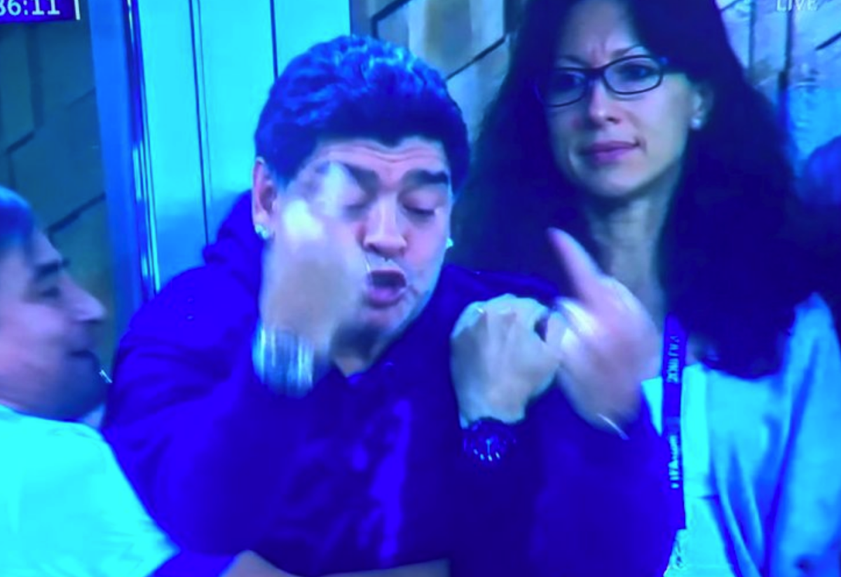 Diego Maradona flicks off the camera after a big goal for Argentina.