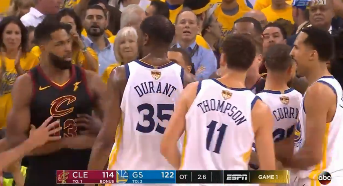 Draymond Green and Tristan Thompson argue.