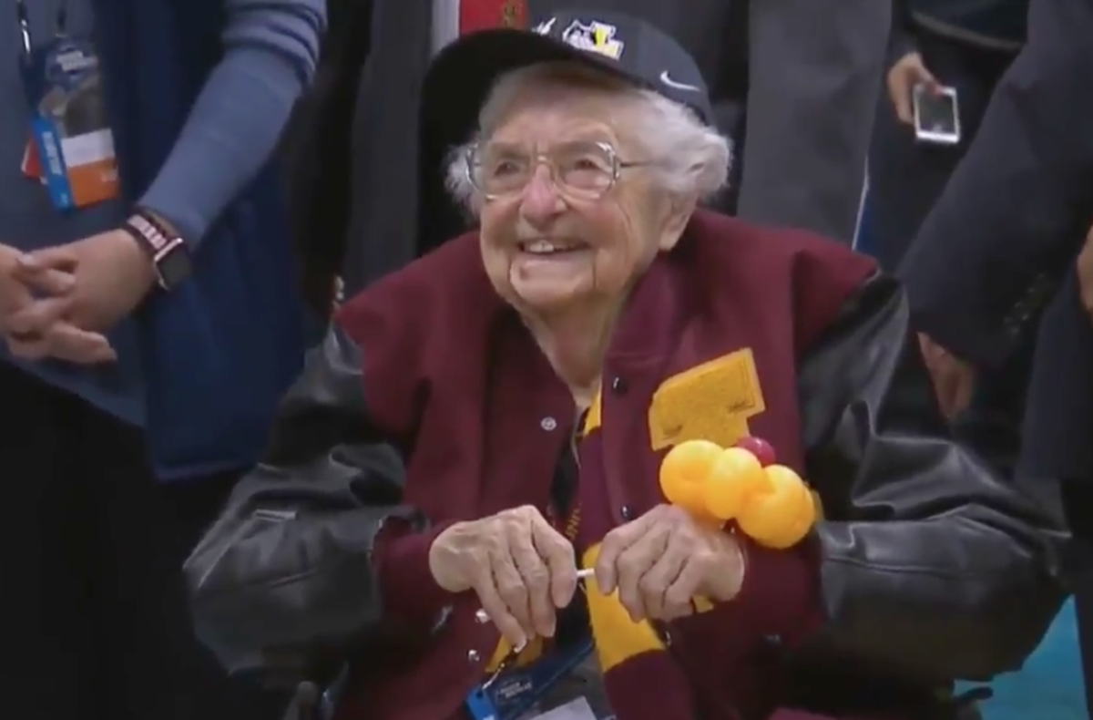 Sister Jean sits courtside.