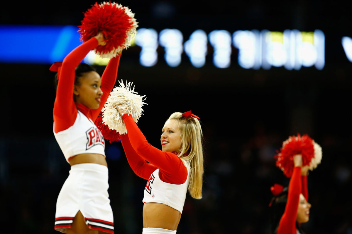 NC State's cheerleading squad during a basketball game against Villanova.