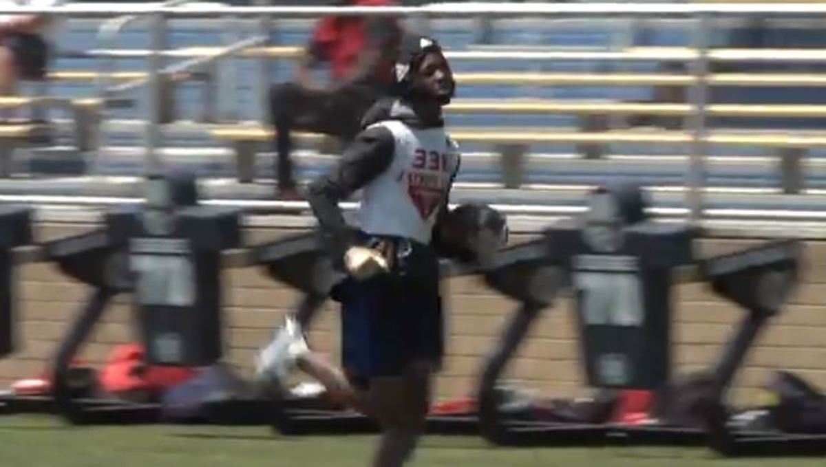 Jameson Williams runs after a catch at a Rivals camp.