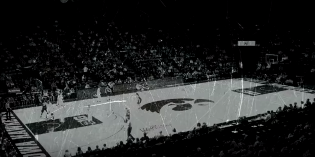 A black and white picture of Iowa basketball's Carver-Hawkeye Arena.
