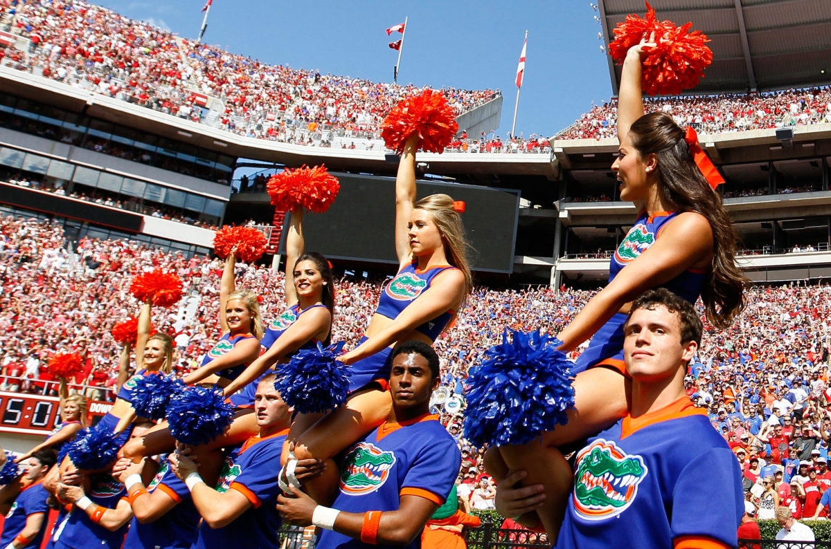 Florida Gators cheerleaders performing during a football game.