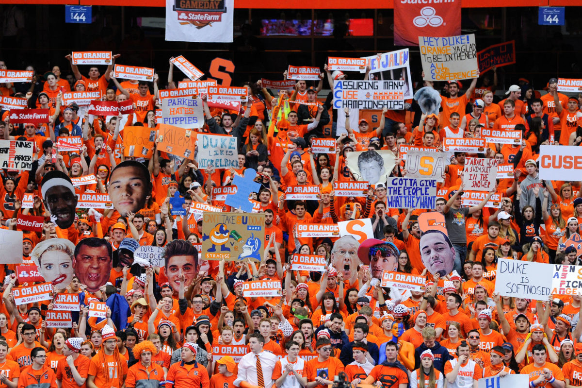Syracuse fans holding signs during College GameDay.