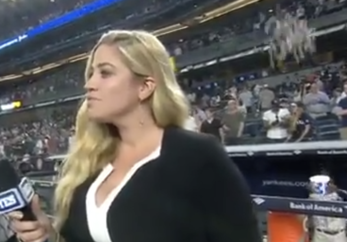 yankees sideline reporter giving an interview
