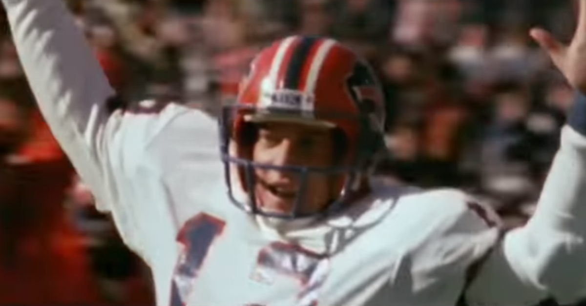 Jim Kelly celebrates a touchdown throw during his Buffalo Bills career.