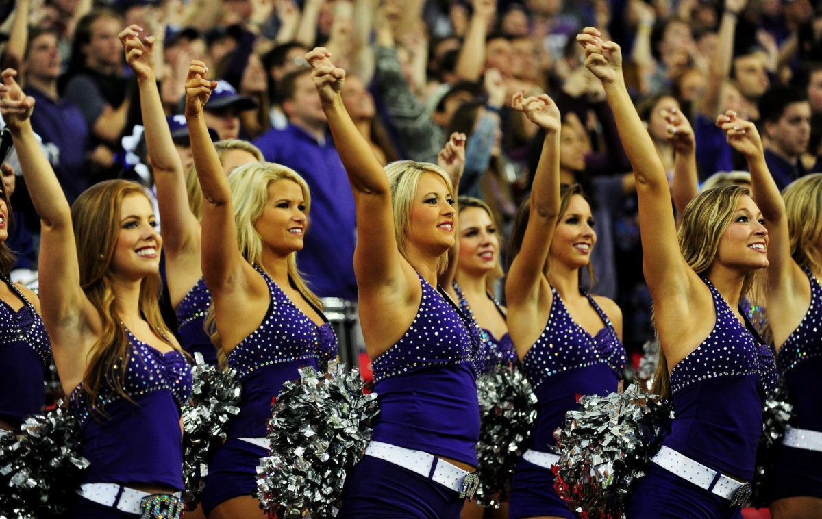 TCU Horned Frogs cheerleaders perform during the Chik-fil-A Peach Bowl against the Ole Miss Rebels at Georgia Dome.