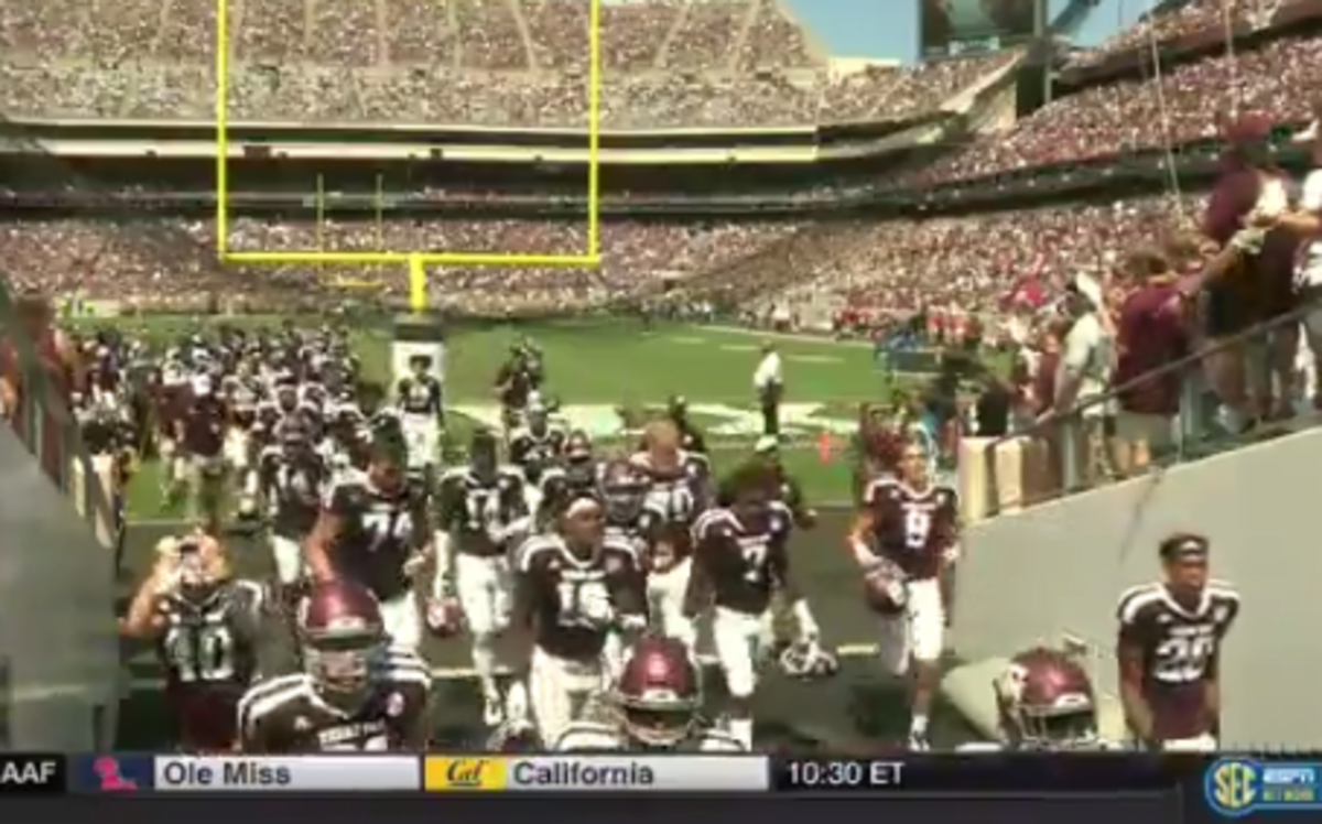 Texas A&M's Will Gunnell flips off fans in tunnel.