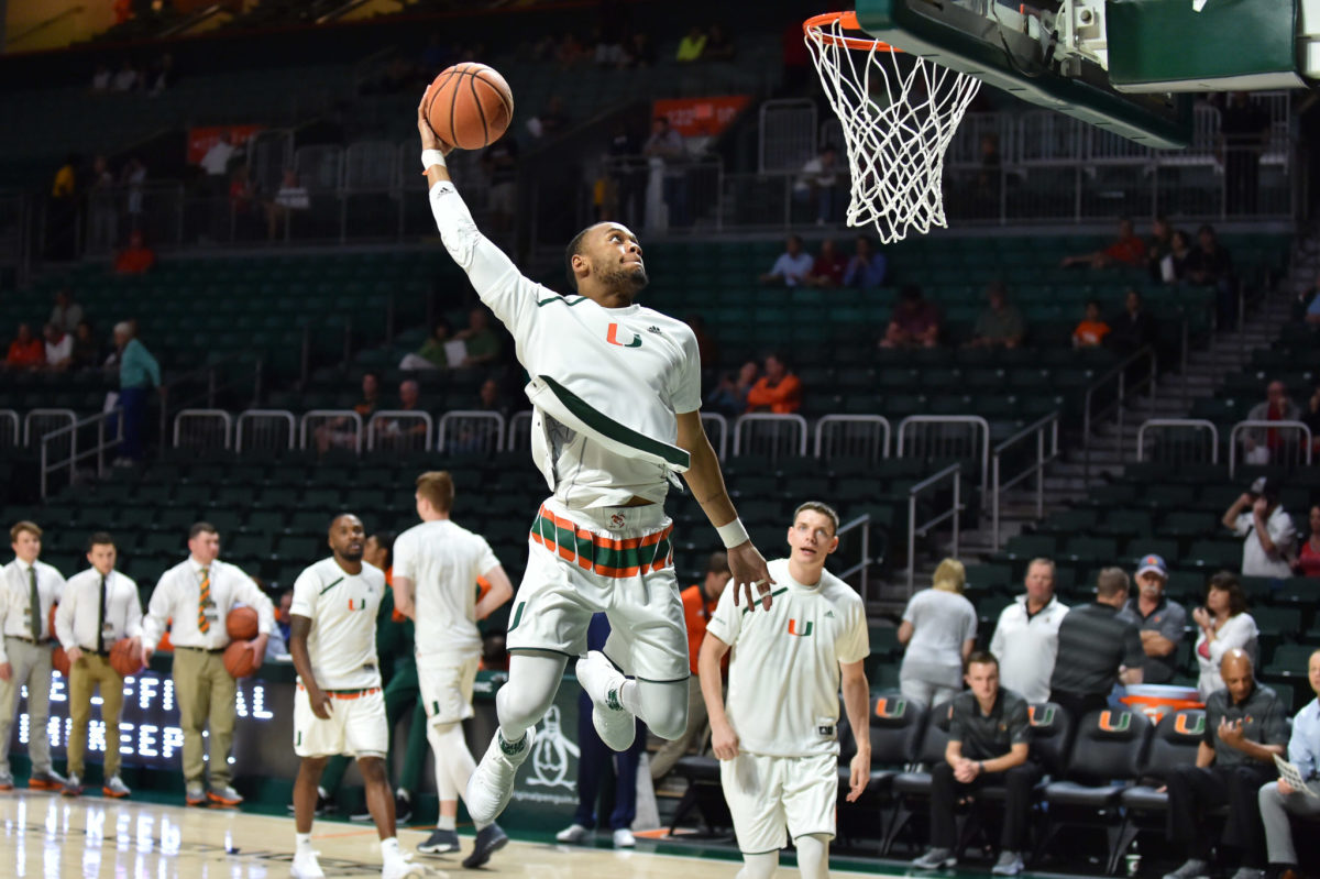 Bruce Brown of Miami dunks in warmups.