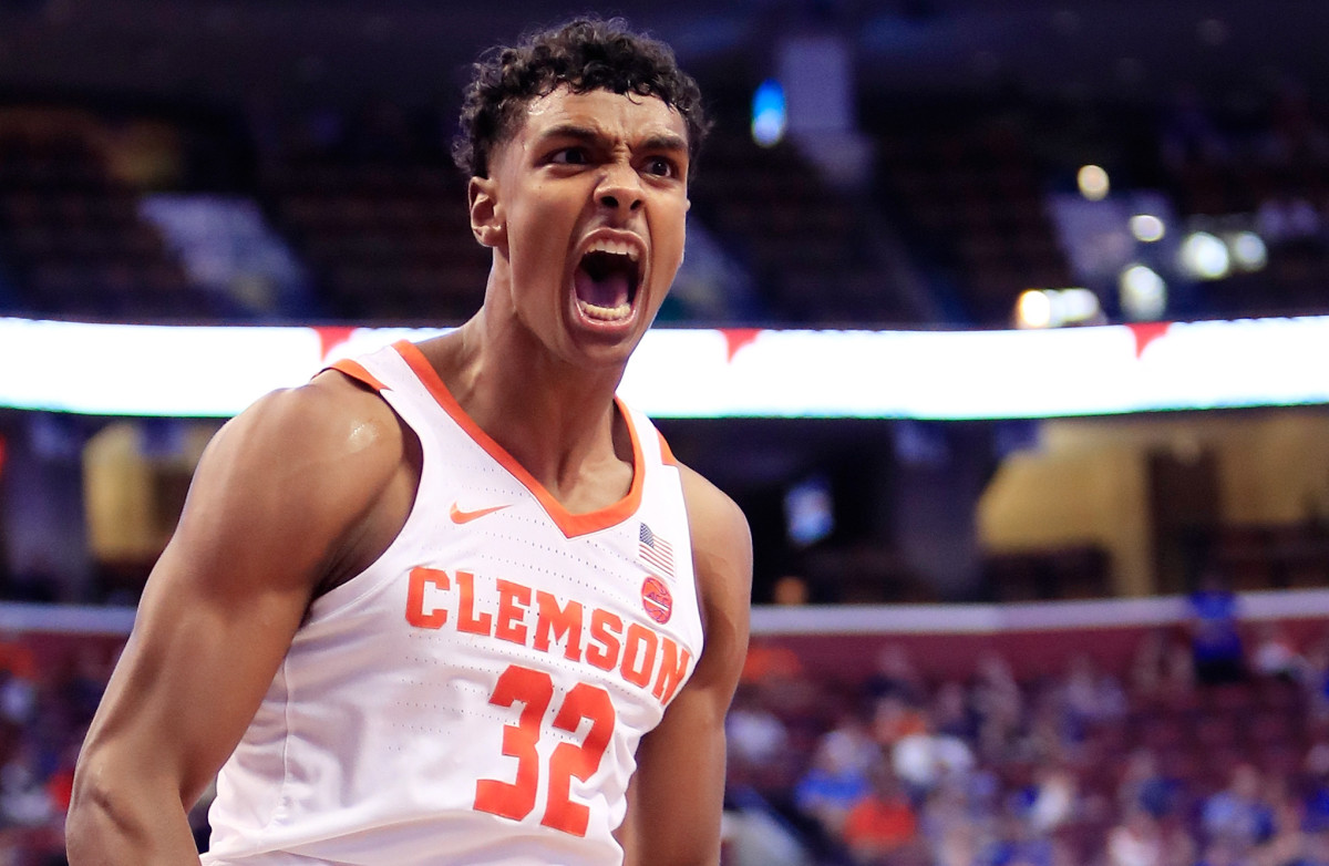 Donte Grantham #32 of the Clemson Tigers reacts to his dunk in the first half against the Florida Gators.