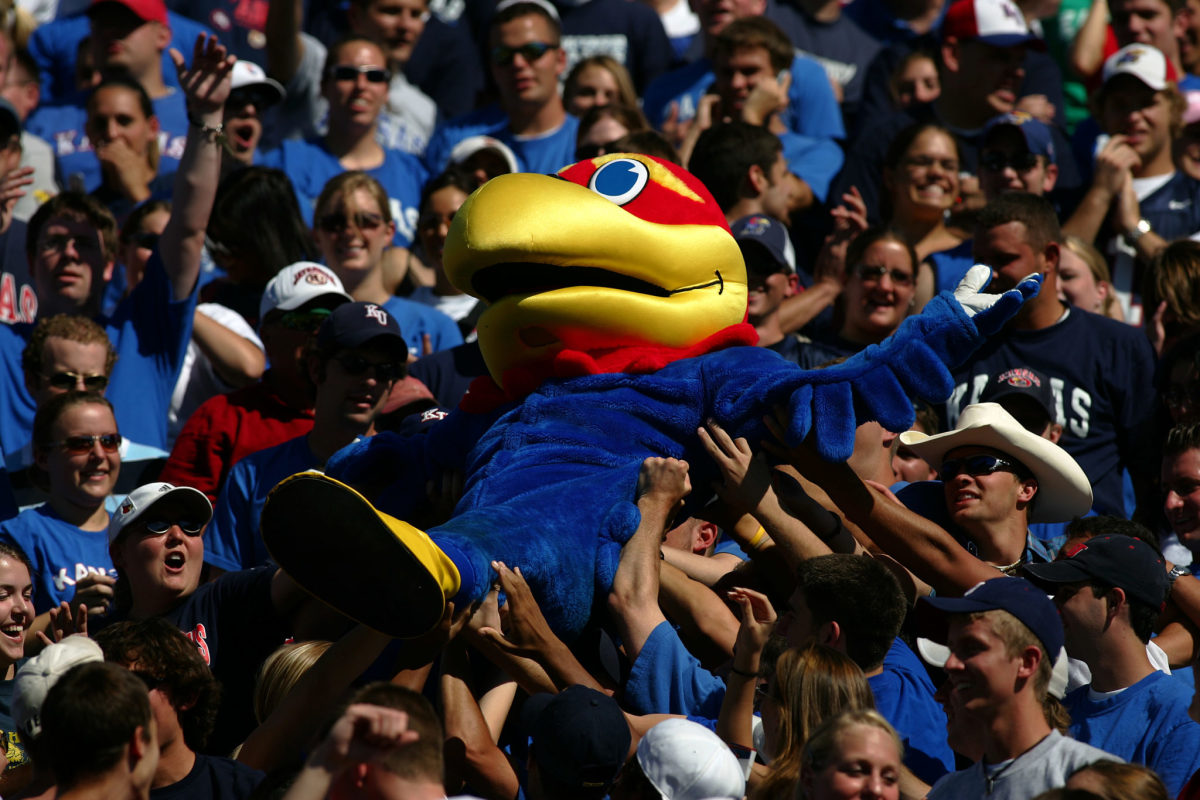 The Kansas Jayhawk mascot crowd surfing.
