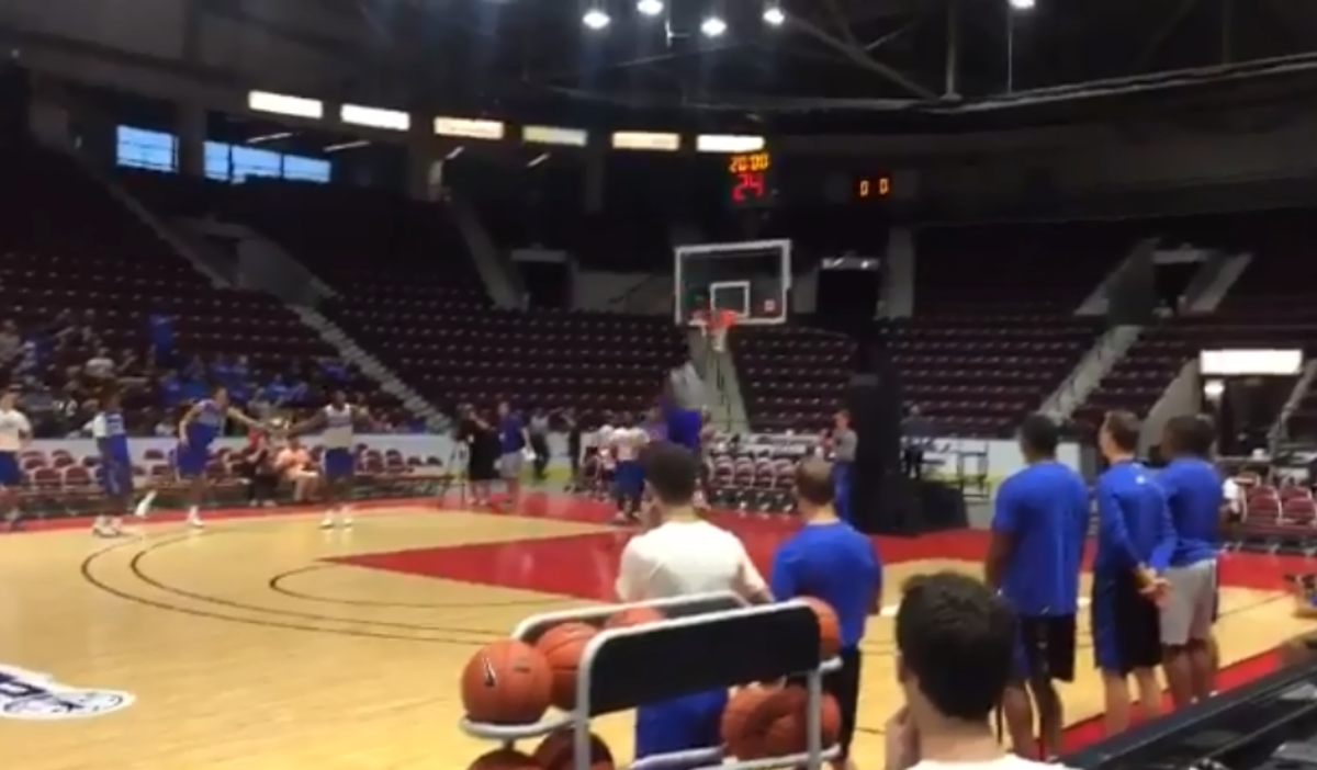 Zion Williamson dunking from the free-throw line.