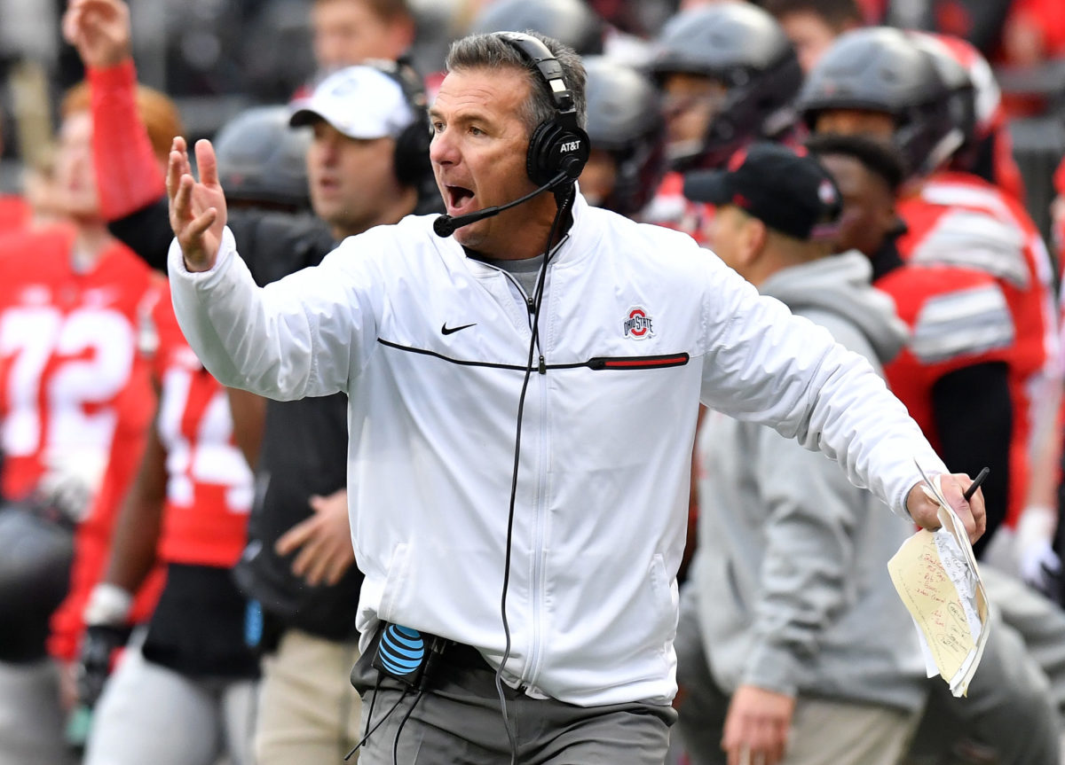 Urban Meyer reacting to play during an Ohio State football game.