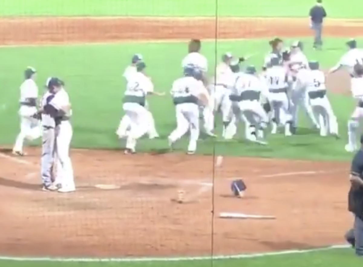 hs pitcher skips celebrating with teammates to console childhood friend