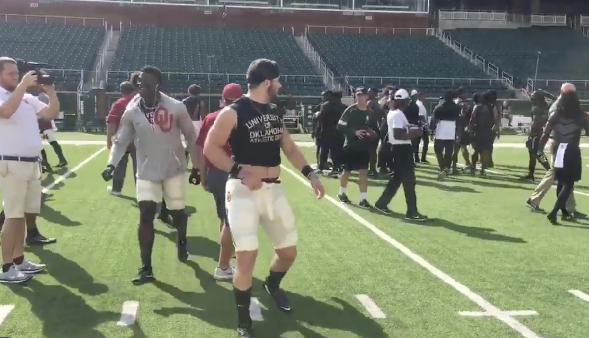 Baker Mayfield taunts Baylor players during warmups.