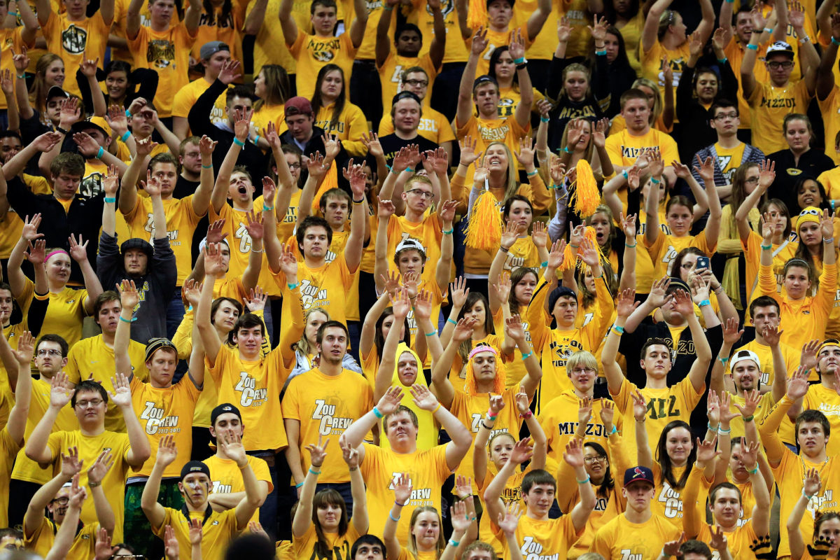 Missouri basketball fans cheering during a home game.