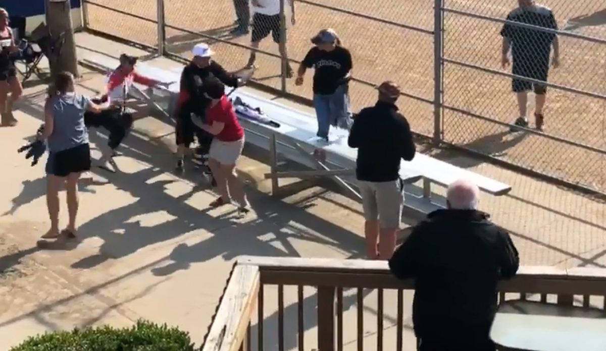 A youth baseball coach attacks a parent with a bat.