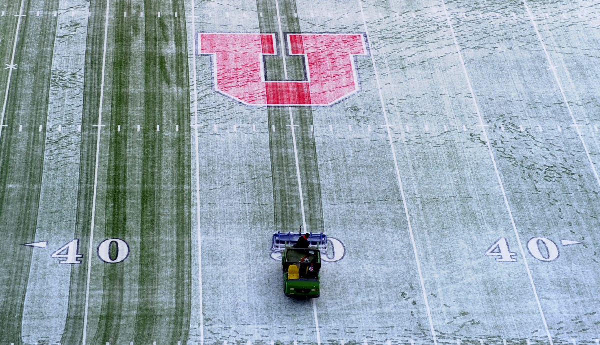 A general view of Utah's football field with snow on it.