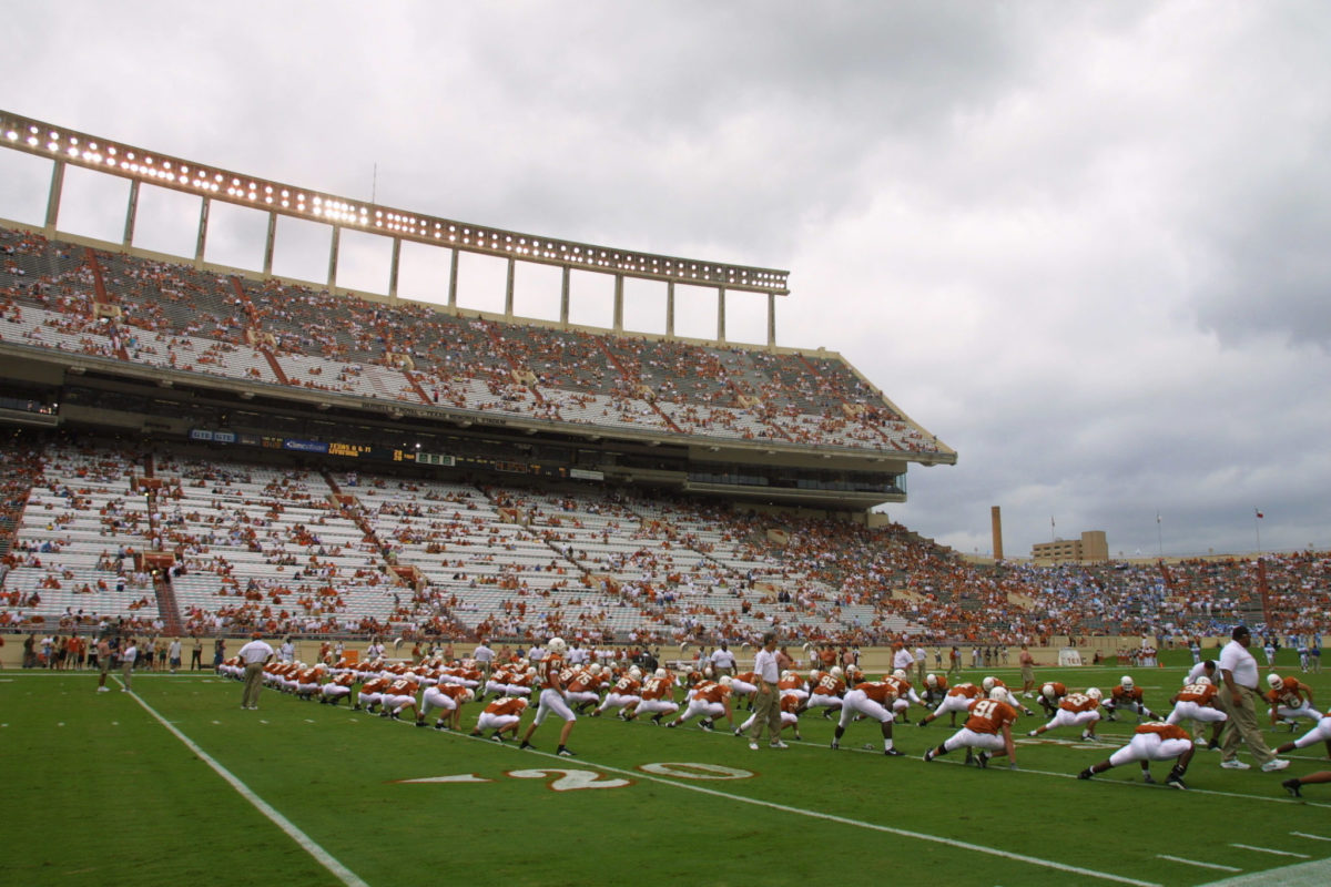 The Texas Longhorns football team warming up before a game.