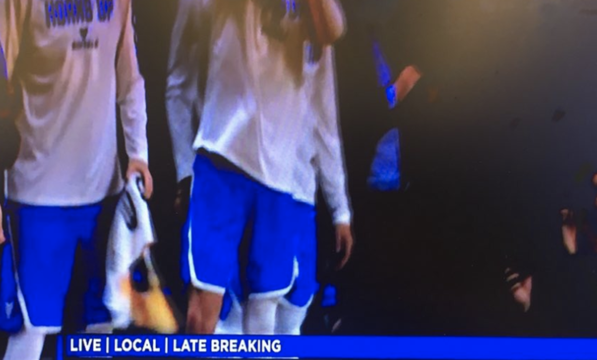 College basketball program featured on local news.