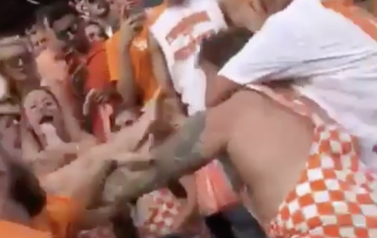 Tennessee and Georgia fans get into fight in the stands.