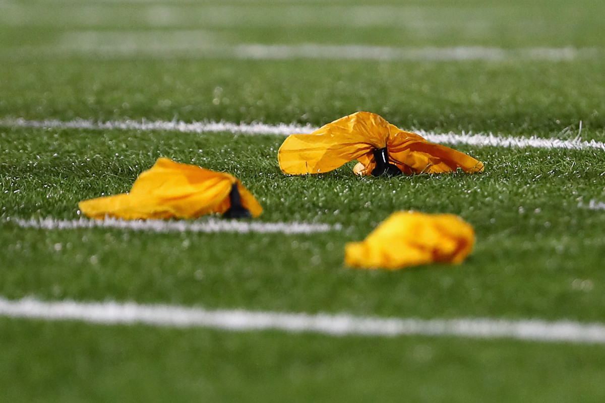 Penalty flags lying on the field.