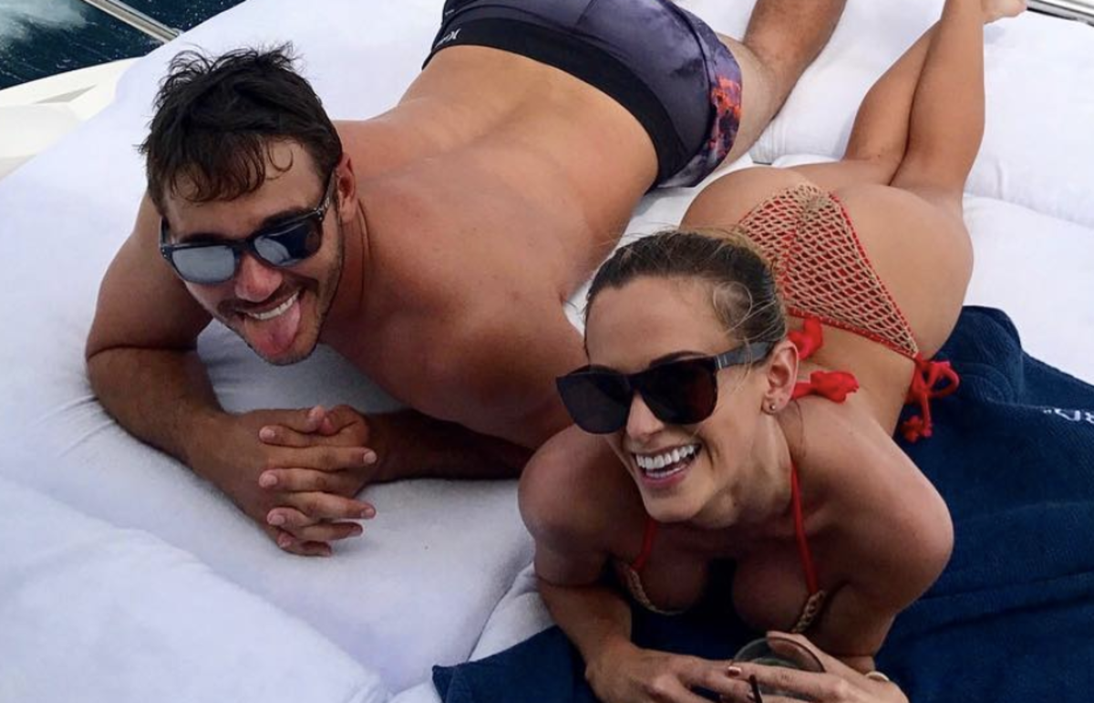 Jena Sims in a bathing suit on a boat.