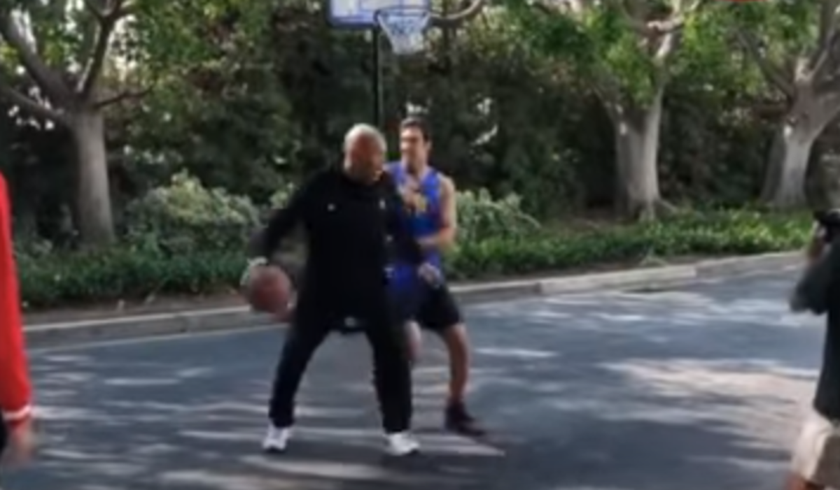 LaVar Ball backs a guy down in a game of one-on-one.