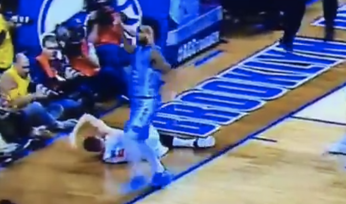 Joel Berry holds his hands up.