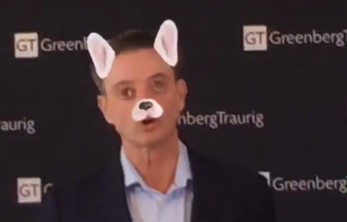 Rick Pitino with a dog filter on him.