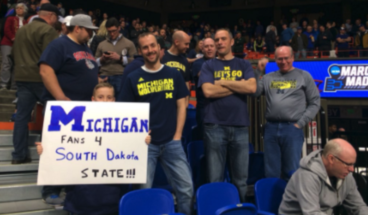 Michigan fans troll Ohio State with sign.