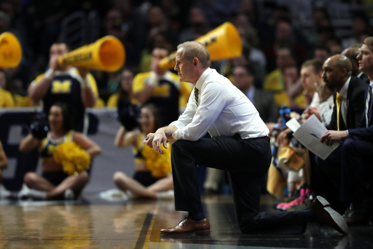 Head coach John Beilein of the Michigan Wolverines reacts against the Florida State Seminoles during the first half in the 2018 NCAA Men's Basketball Tournament.