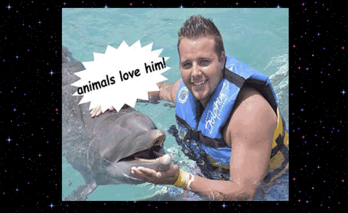A picture of Oklahoma State's Zach Sinor with a dolphin.