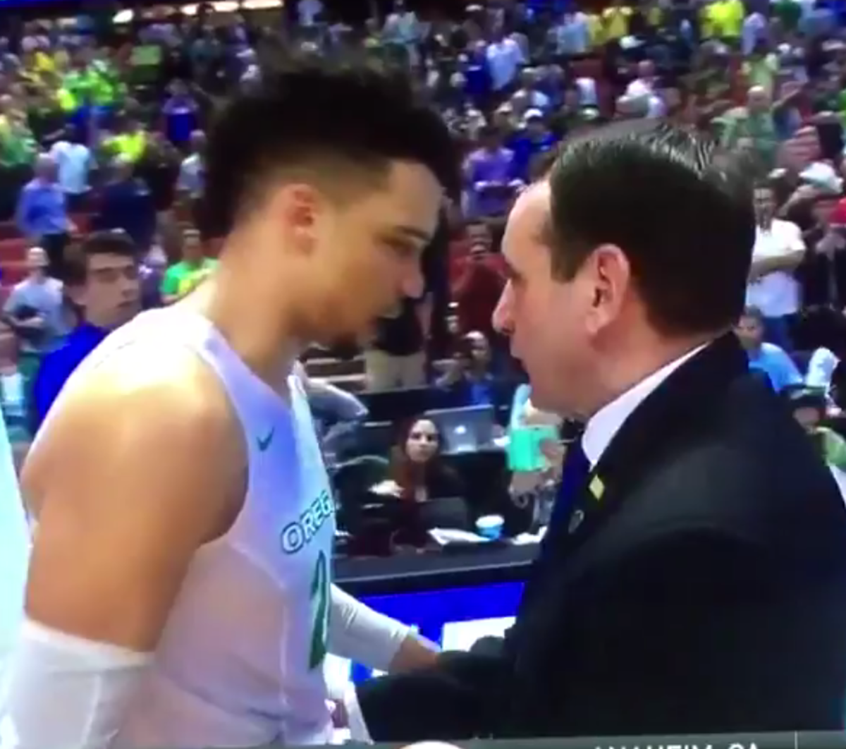 Duke's Coach K talks with Dillon Brooks after the game.