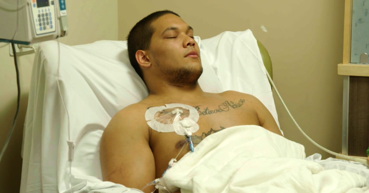 James Conner lying in a hospital bed.