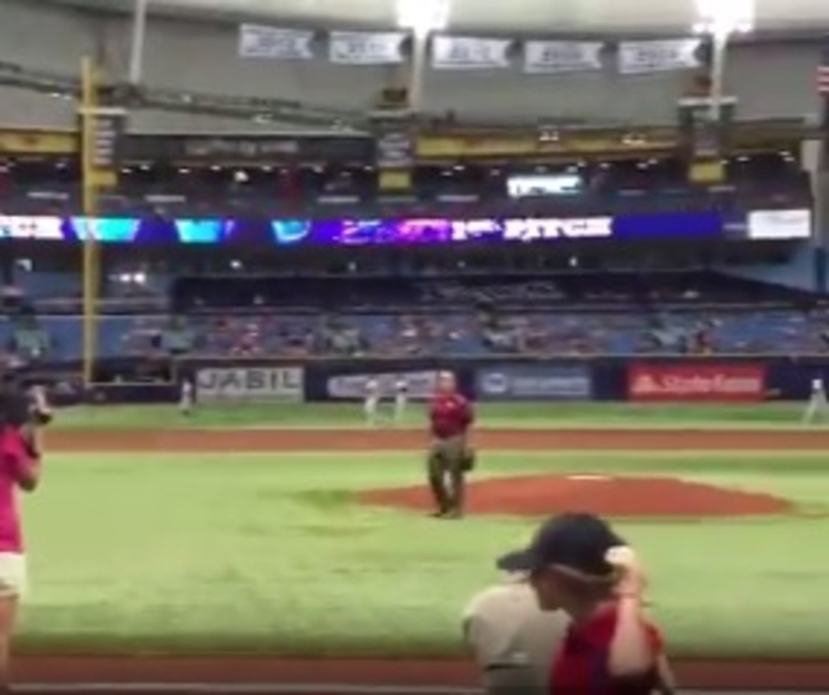 Jimbo Fisher by the pitchers mound at a Tampa Bay Rays game.