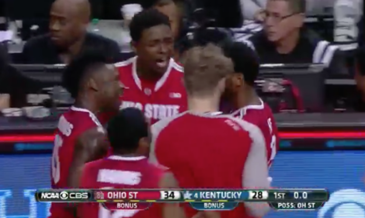 Ohio State players celebrate after making a 3 pointer at the end of the first half.