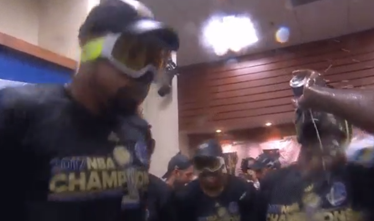 Kevin Durant celebrates in the locker room.