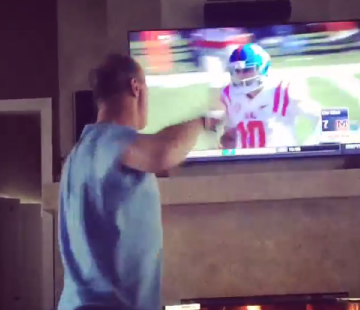Jim Kelly cheering when Chad Kelly throws a touchdown on tv.