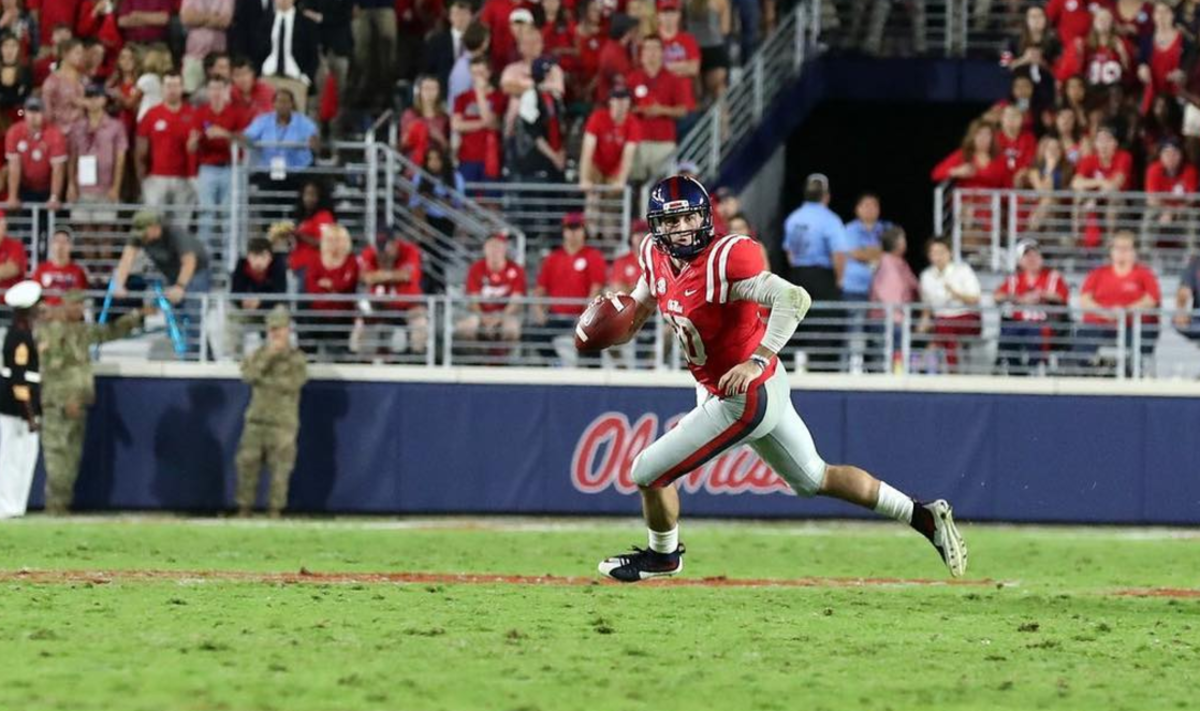 Chad Kelly scrambles to try to score for Ole Miss.