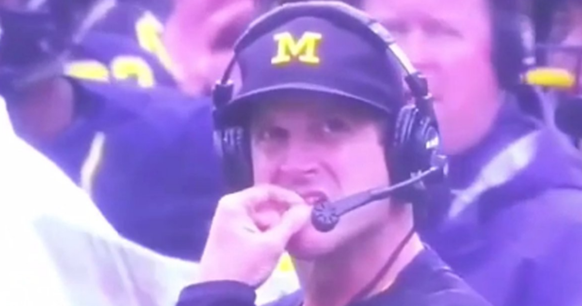Jim Harbaugh picking his nose and eating it during a game.