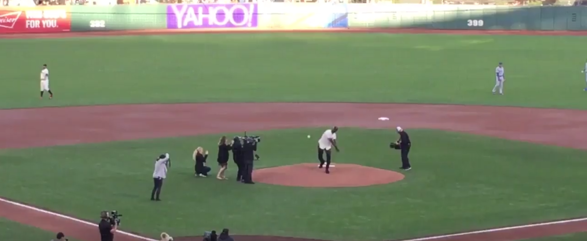 Draymond Green throwing out the first pitch at a Giants game.